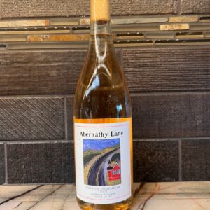 Bottle of Abernathy Lane Rose of Grenache on a marble counter